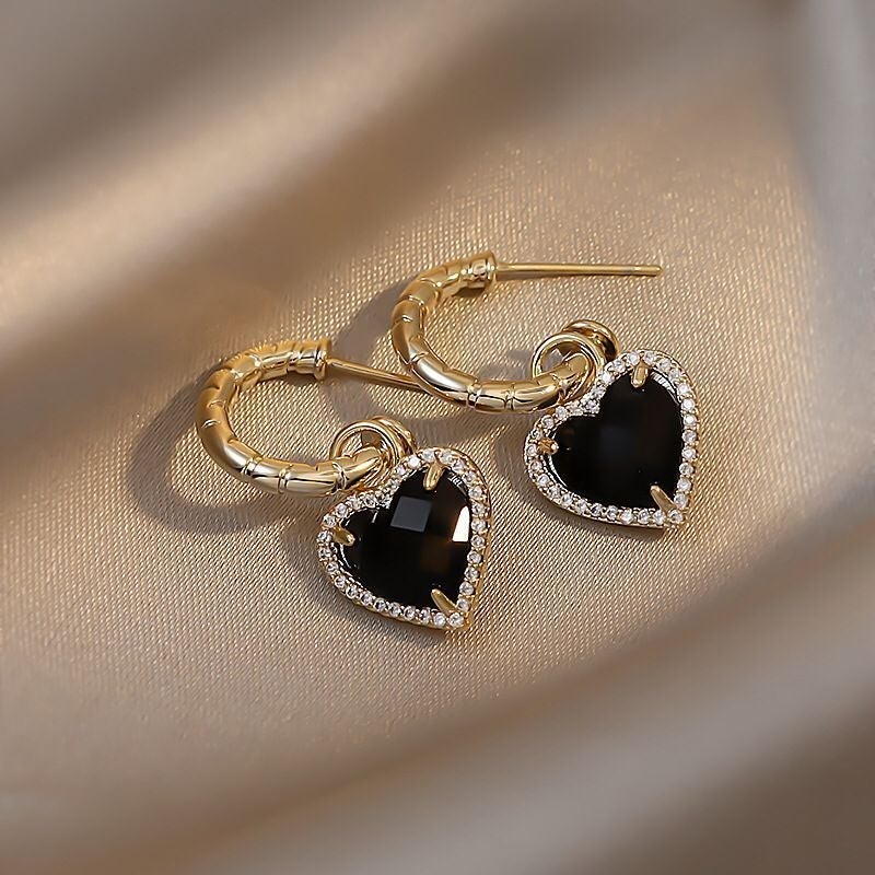 Boucles d'oreilles en forme de cœur noires en or