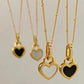 Collier cœur noir et blanc en or