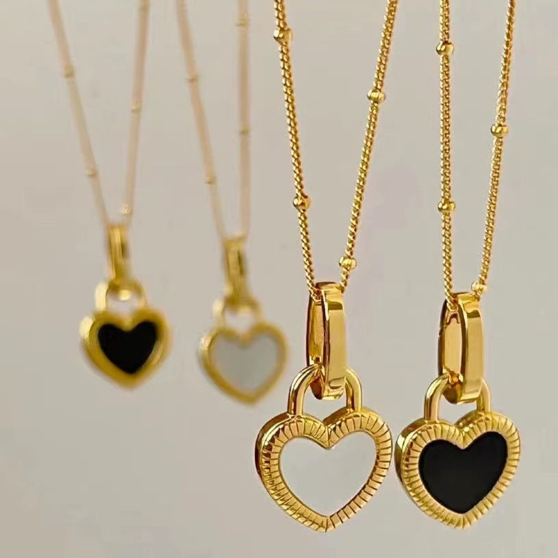 Collier cœur noir et blanc en or
