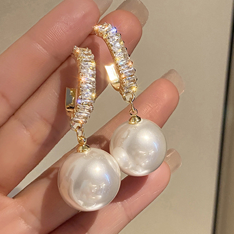 Boucles d'oreilles de luxe avec perles et zirconiums