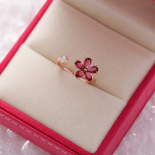 Bague réglable fleur de cristal rouge en or