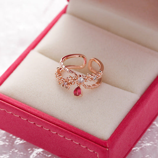 Bague réglable en or avec zircone et rubis