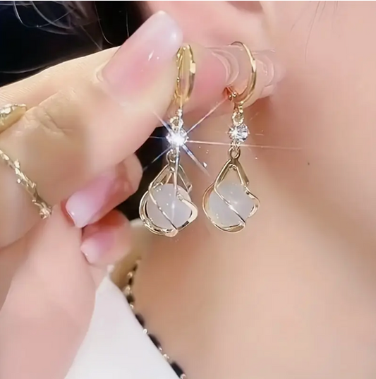 Boucles d'oreilles en opale vintage en or serti