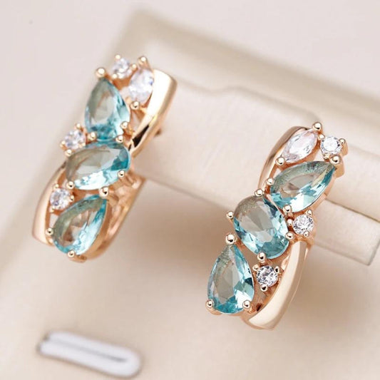 Boucles d'oreilles en zirconia bleue plaquées or