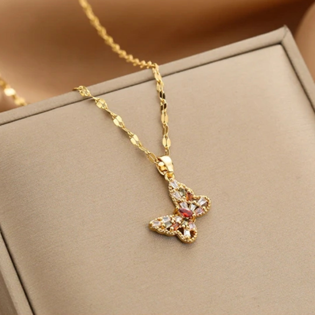 Collier papillon en cristal or