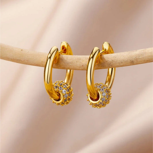 Boucles d'oreilles sphériques étincelantes en or