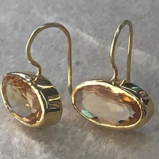 Boucles d'oreilles en or avec incrustations de cristal