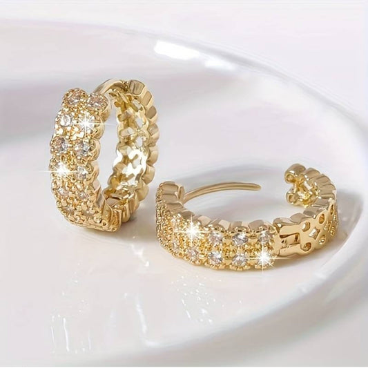 Boucles d'oreilles élégantes brillantes et nobles