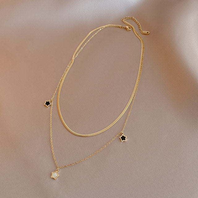Éblouissants Bijoux Étoilés en Élégant Noir et Blanc