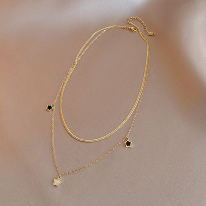 Éblouissants Bijoux Étoilés en Élégant Noir et Blanc