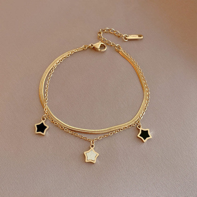 Éblouissants Bijoux Étoilés en Élégant Noir et Blanc