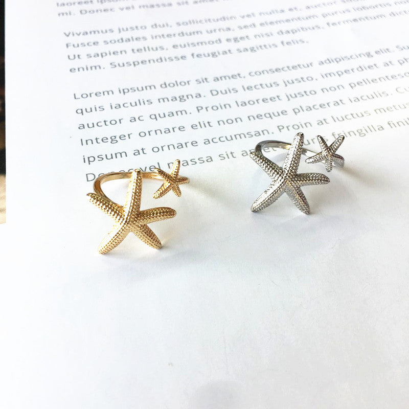 Bague étoile de mer réglable en argent et en or