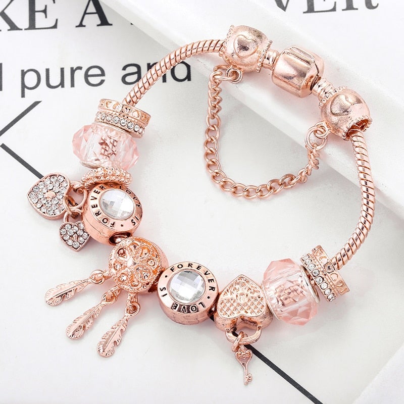 Charmant Bracelet Attrape-rêves Rose avec Breloques Argentées Incluses