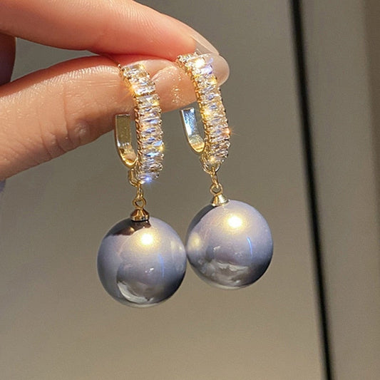 Boucles d'oreilles de luxe avec perles et zirconiums