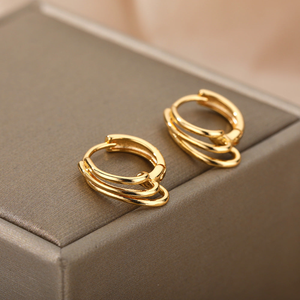 Boucles d'oreilles rondes minimalistes en or