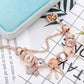 Charmant Bracelet Attrape-rêves Rose avec Breloques Argentées Incluses
