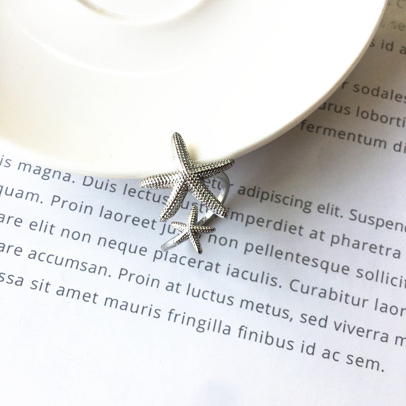 Bague étoile de mer réglable en argent et en or