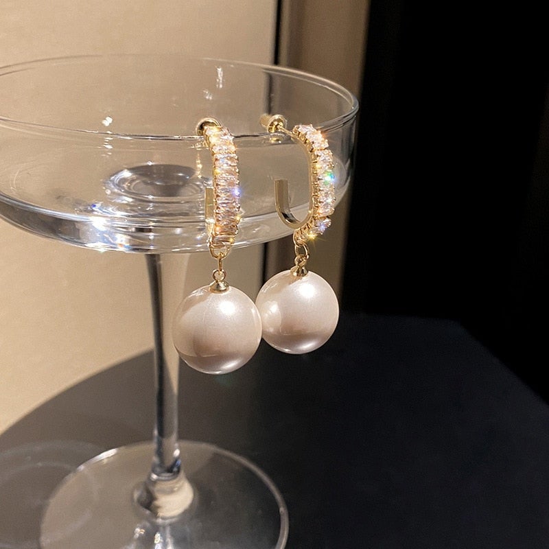 Boucles d'oreilles de luxe avec perles et zirconiums