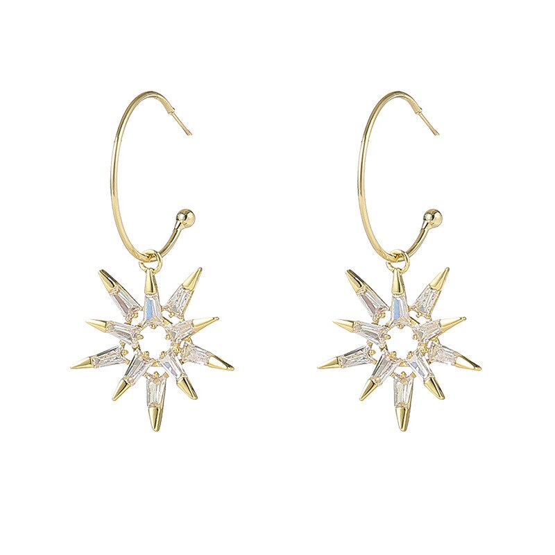 Boucles d'oreilles en forme d'étoile en or et argent