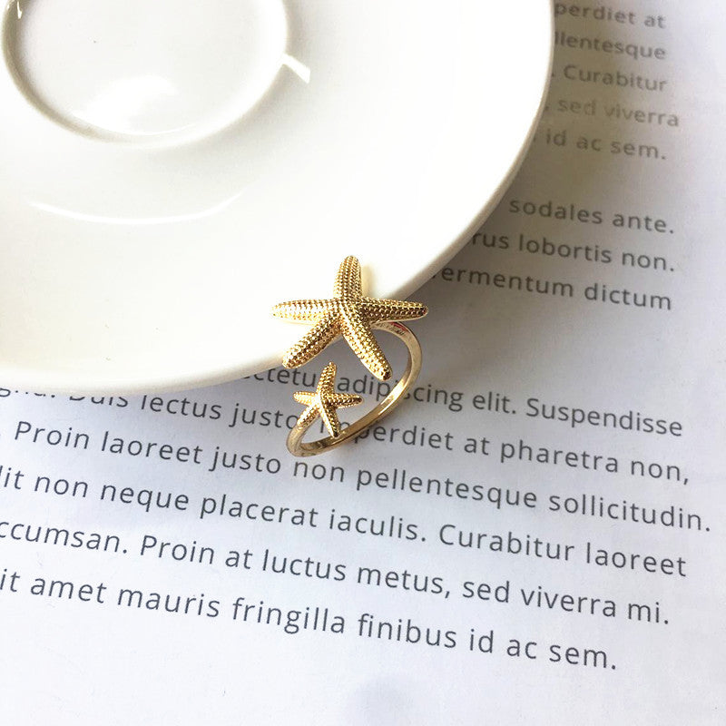Bague étoile de mer réglable en argent et en or