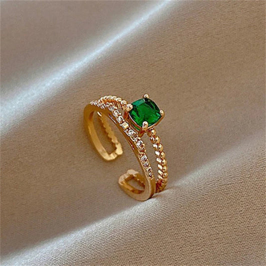 Anneau réglable avec zircon vert en or