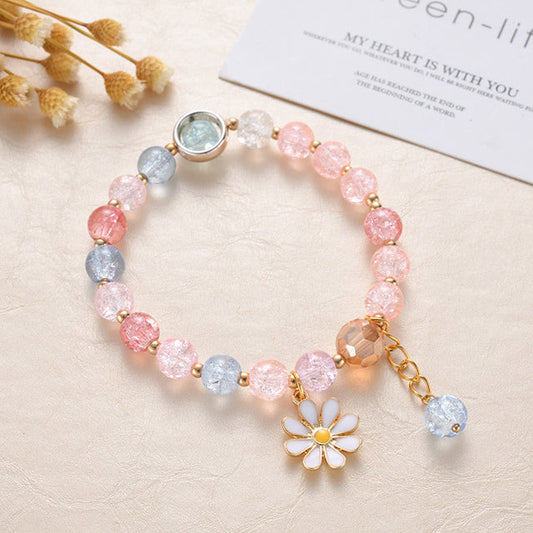 Bracelet Élégant en Pierres Roses et Bleues Agrémenté de Fleurs de Marguerite en Or