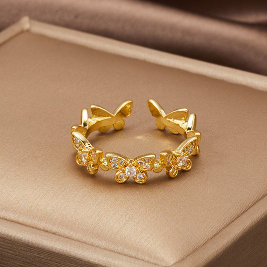 Bague papillon réglable en or