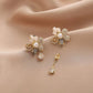 Boucles d'oreilles à pendentifs floraux avec perles en or