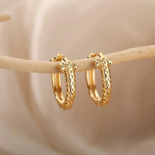 Boucles d'oreilles minimalistes en forme de serpent en or