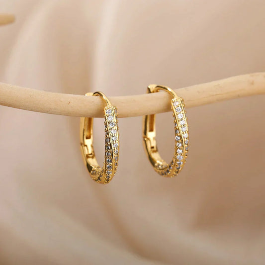 Boucles d'oreilles minimalistes en or brillant irrégulier