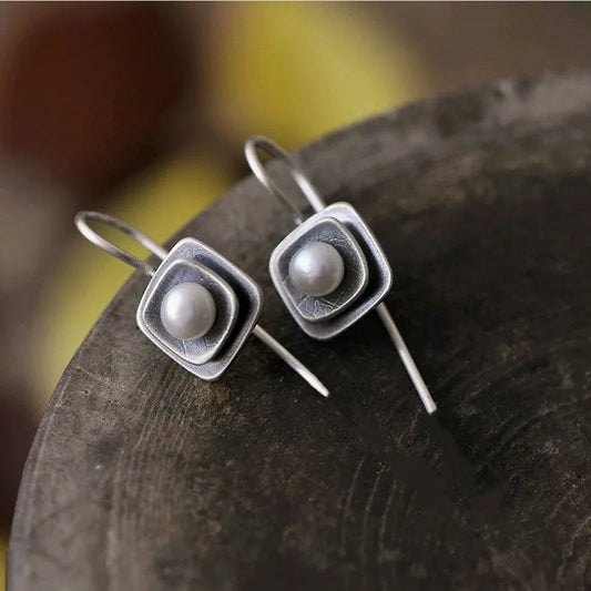 Boucles d'oreilles en argent vintage avec inlays de perles
