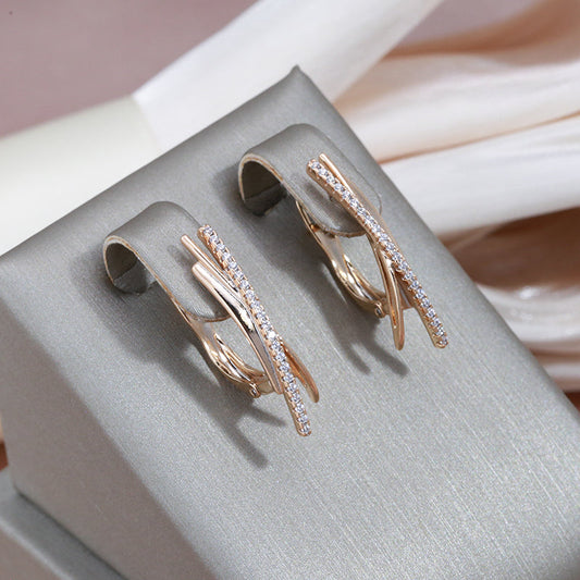 Boucles d'oreilles croisés en brillants exquis en or