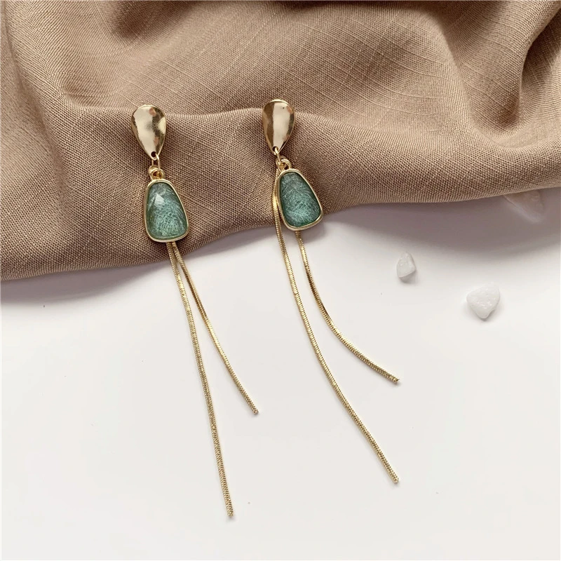 Boucles d'oreilles avec pierre de turquoise en or