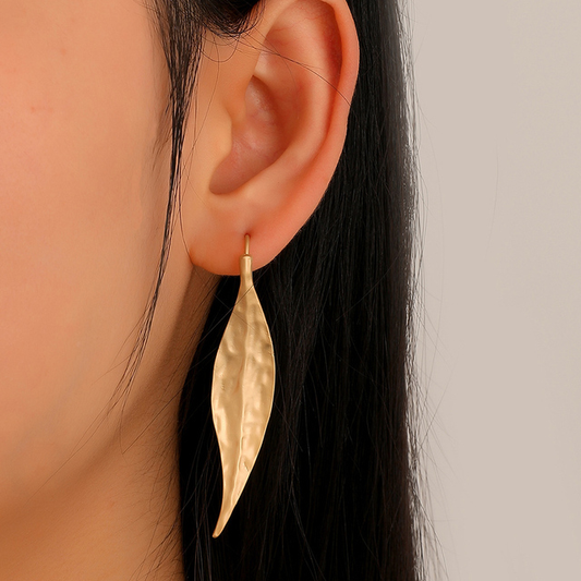 Boucles d'oreilles vintage avec feuille dorée