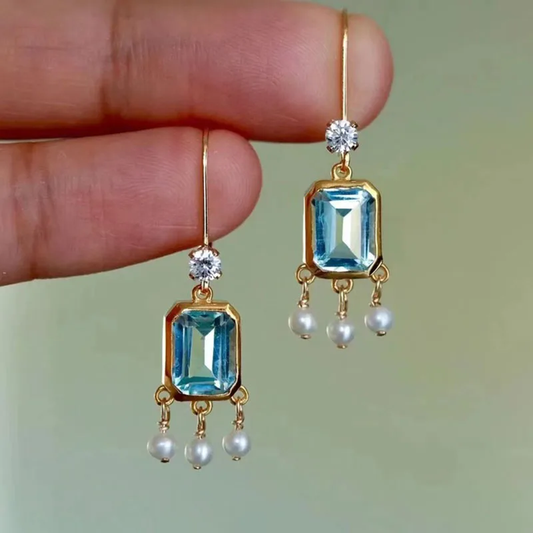 Boucle d'oreilles vintage avec pendentif en cristal bleu