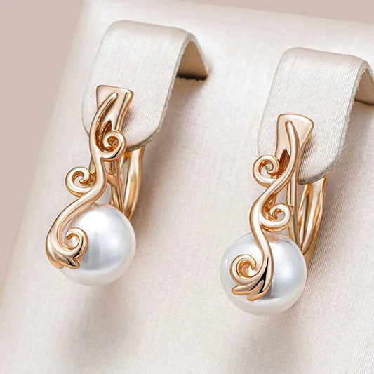 Boucles d'oreilles élégantes en perles dorées