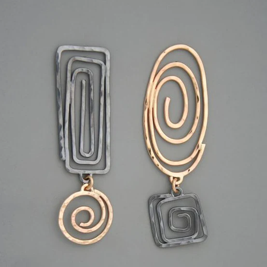 Boucles d'oreilles en spirale vintage en or et en argent