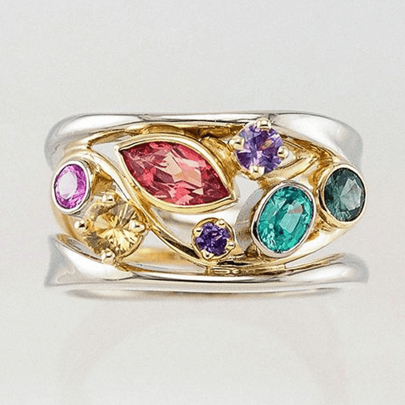 Bague vintage en or et argent avec zircone colorée