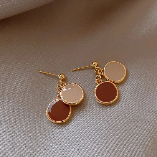 Boucles d'oreilles élégantes en or rouge et en or blanc