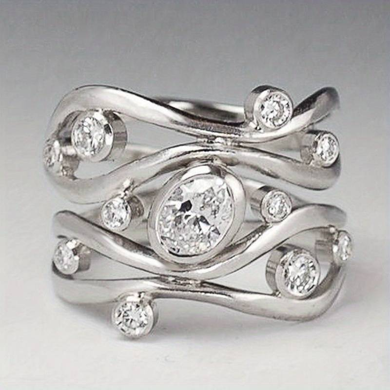 Bague en argent avec zirconia vintage irrégulière