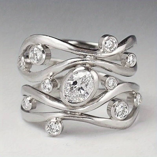 Bague en argent avec zirconia vintage irrégulière