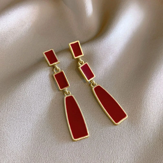 Boucles d'oreilles pendantes élégantes en or rouge
