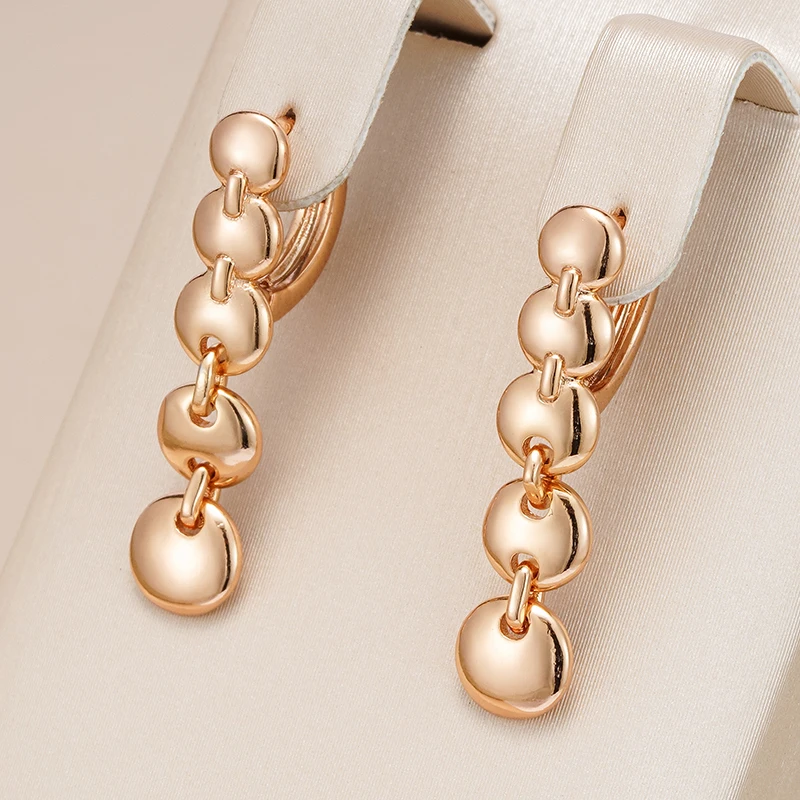 Boucles d'oreilles pendantes élégantes plaquées or