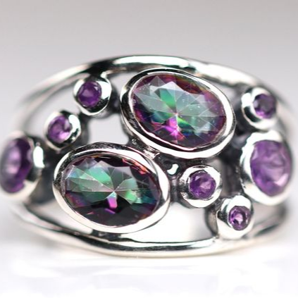 Bague avec inlay en cristal coloré en argent vintage
