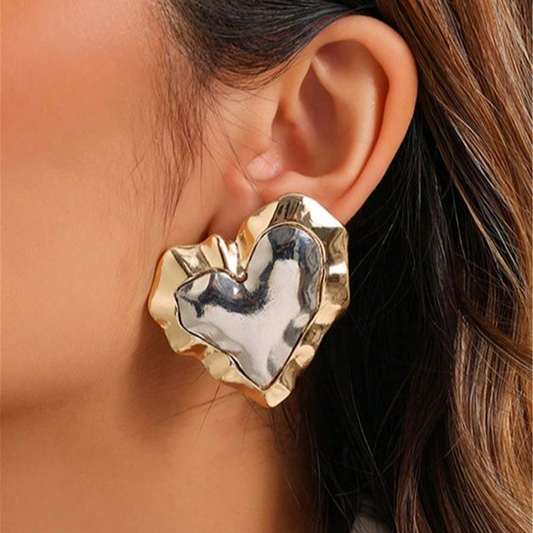 Boucles d'oreilles en forme de cœur en or et en argent